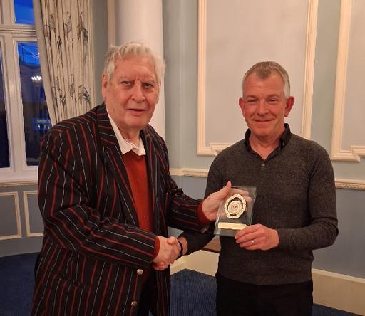Tony Flood presenting Anderida Accolade to Rob Crouch